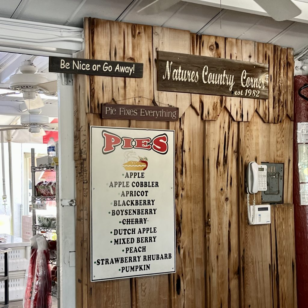 Pies of the day store sign