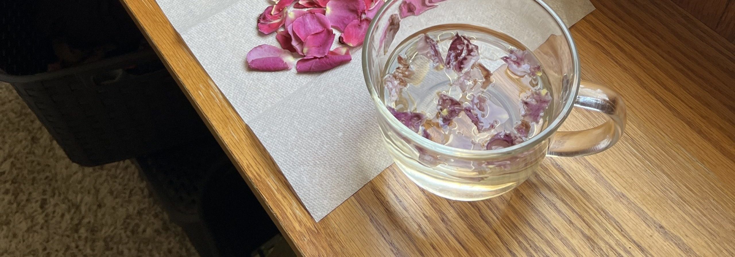 Rose petals laying on a paper towel