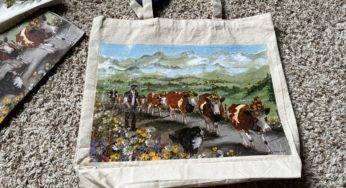 Using vintage thrifted napkins for decoupage on a canvas tote