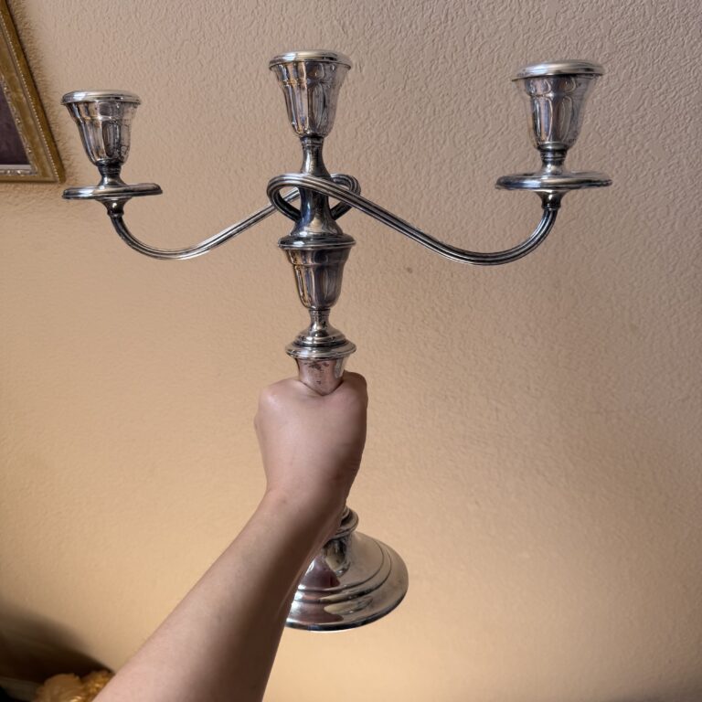 Polished silver candle holder