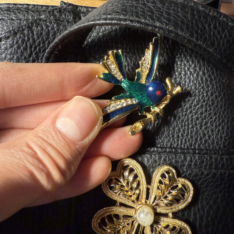 laying down bird pin